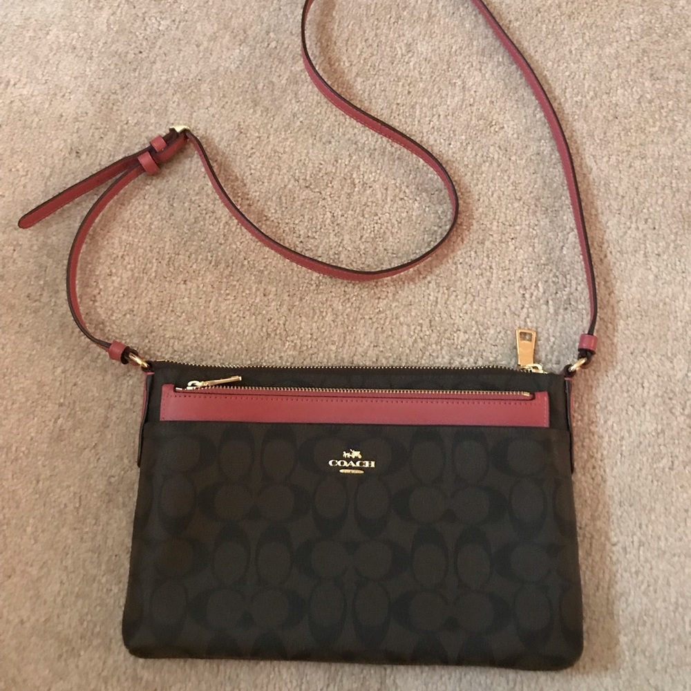 Dark brown and pink Coach cross body bag